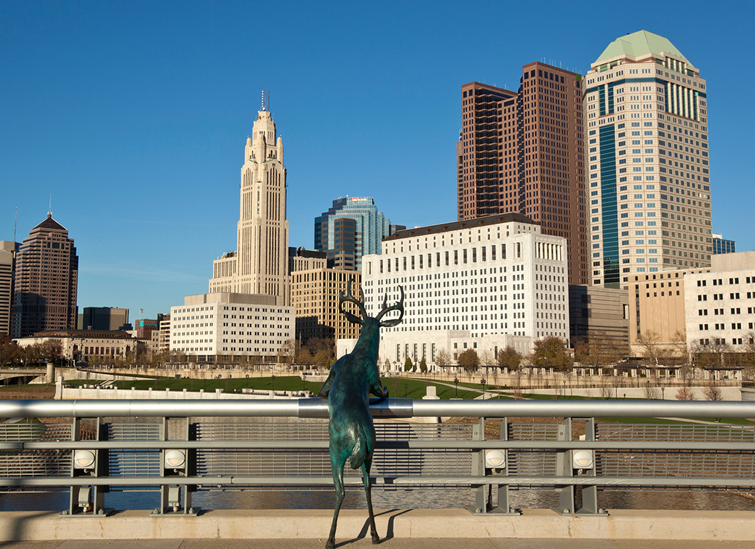 Contact - Deer Statue Standing on the Rich Street Bridge Gazing at the City of Columbus
