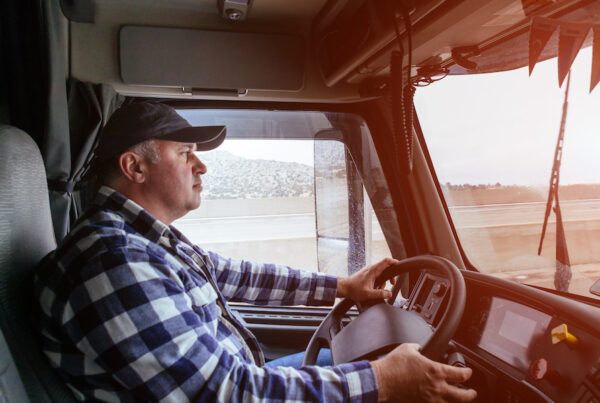 Top 3 Tips for Understanding What Insurance You Need as a Trucker - Man Driving A Truck